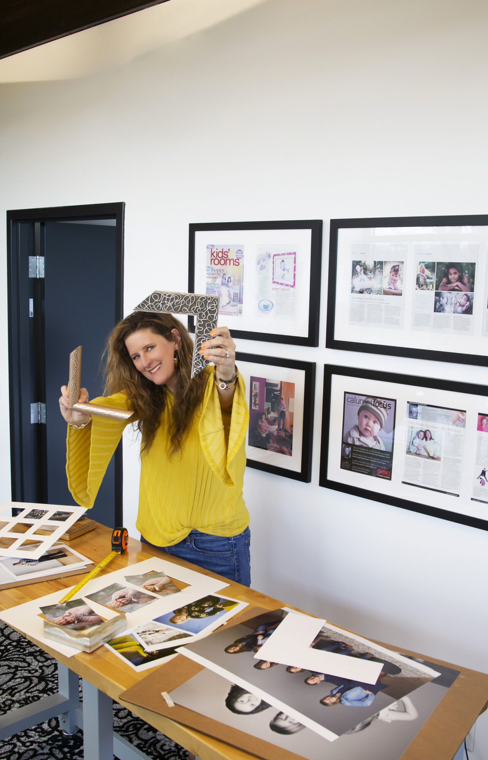 Sarah holding up Wall Art Frames Sarah holding up Wall Art Frames